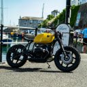 yellow Trump motorcycle by the seaside  screen for extension Chrome web store in OffiDocs Chromium