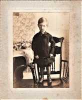 Free download Young Boy On A Chair free photo or picture to be edited with GIMP online image editor