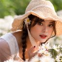 Young girl with chrysanthemums  screen for extension Chrome web store in OffiDocs Chromium
