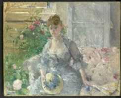 Free download Young Woman Seated on a Sofa free photo or picture to be edited with GIMP online image editor