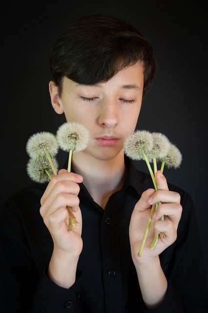Free download young man boy teen hand flower free picture to be edited with GIMP free online image editor