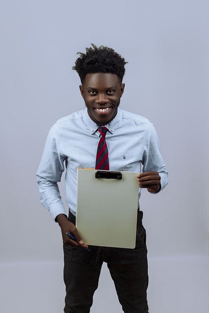 Free download young man smiling clipboard free picture to be edited with GIMP free online image editor