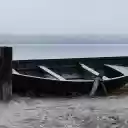 Abandoned Boat Near Lake in Wintry  screen for extension Chrome web store in OffiDocs Chromium