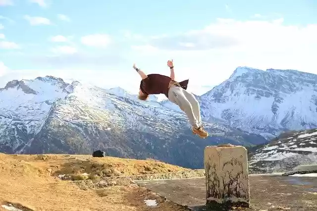 Free download Acrobatics Somersault Mountains -  free photo or picture to be edited with GIMP online image editor