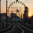 A ferris wheel at sunset on a street  screen for extension Chrome web store in OffiDocs Chromium