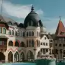 A fountain in front of a building with a clock tower  screen for extension Chrome web store in OffiDocs Chromium