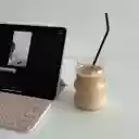 A Fresh Milk Coffee Beside an iPad  screen for extension Chrome web store in OffiDocs Chromium