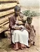 Free download African-American Woman breastfeeding baby with female child free photo or picture to be edited with GIMP online image editor