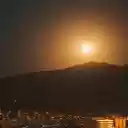 A Full Moon over a Cityscape  screen for extension Chrome web store in OffiDocs Chromium