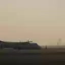 Aircraft on Runway at Sunrise in Schwechat  screen for extension Chrome web store in OffiDocs Chromium
