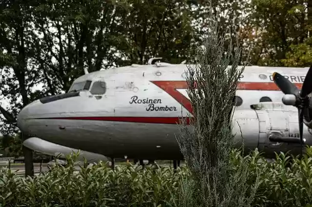 Free download airplane vehicle aircraft grass free picture to be edited with GIMP free online image editor