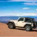 A Jeep JK on a Mountain  screen for extension Chrome web store in OffiDocs Chromium