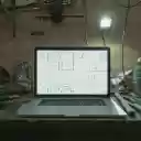 A Laptop on a Work Table  screen for extension Chrome web store in OffiDocs Chromium