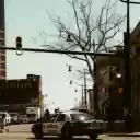 A Police Car Making a Turn at an Intersection  screen for extension Chrome web store in OffiDocs Chromium