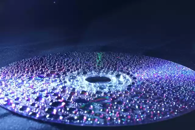 Free download artificial light waterdrop cd drops free picture to be edited with GIMP free online image editor