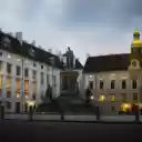 A statue is in front of a building at dusk  screen for extension Chrome web store in OffiDocs Chromium