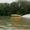 A yellow speed boat is speeding through the water  screen for extension Chrome web store in OffiDocs Chromium