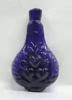 Free download Blue-colored flacon de poche decorated with fleur de lys, hearts and roses free photo or picture to be edited with GIMP online image editor