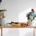 Bouquet of hydrangeas and rose on table with sunflowers  screen for extension Chrome web store in OffiDocs Chromium