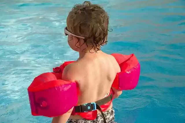 Free download Child Swimming Pool Buoy -  free photo or picture to be edited with GIMP online image editor