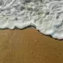 Close up of a Foamy Wave on the Shore  screen for extension Chrome web store in OffiDocs Chromium