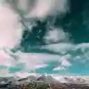 Clouds fly over the mountain top  screen for extension Chrome web store in OffiDocs Chromium