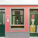 Colorful Street Art on Funchal Building Façade  screen for extension Chrome web store in OffiDocs Chromium