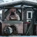 Cozy Outdoor Pizza Oven in Snowy Setting  screen for extension Chrome web store in OffiDocs Chromium