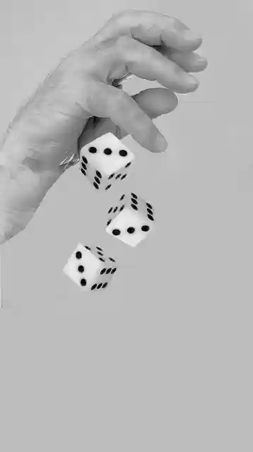 Free download dice hand play monochrome free picture to be edited with GIMP free online image editor