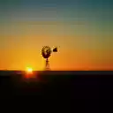 early dawn over a windmill on the prairie  screen for extension Chrome web store in OffiDocs Chromium