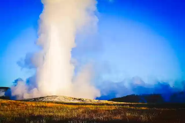Free download geyser smoke blue sky field free picture to be edited with GIMP free online image editor