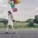 Girl holding balloons  screen for extension Chrome web store in OffiDocs Chromium