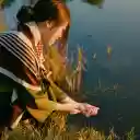 Girl releases fish  screen for extension Chrome web store in OffiDocs Chromium
