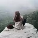 Girl sitting on a rock  screen for extension Chrome web store in OffiDocs Chromium