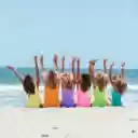 Girls sitting on the beach  screen for extension Chrome web store in OffiDocs Chromium