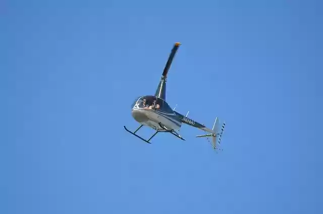 Gratis download Helicopter Tour Flying - gratis foto of afbeelding om te bewerken met GIMP online afbeeldingseditor