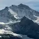 High Mountains Covered in Snow  screen for extension Chrome web store in OffiDocs Chromium