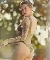 Free download Ireland Baldwin wearing green clothes free photo or picture to be edited with GIMP online image editor