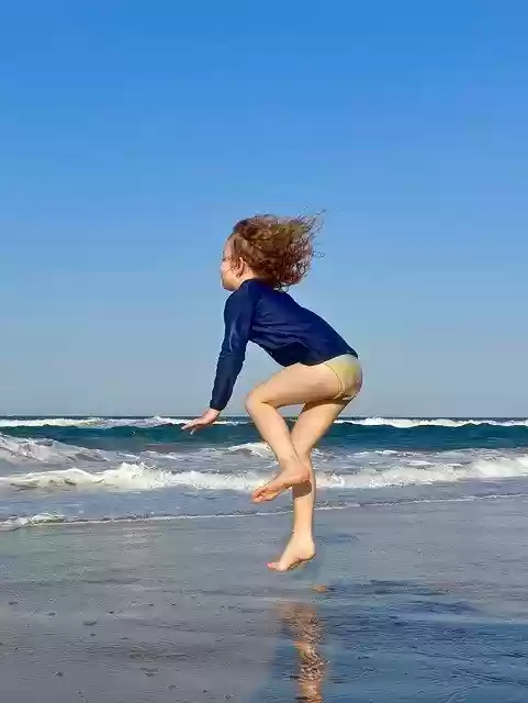 Free download Jump Child Beach -  free photo or picture to be edited with GIMP online image editor