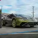 Luxury Olive Green Sports Car at a Gas Station  screen for extension Chrome web store in OffiDocs Chromium