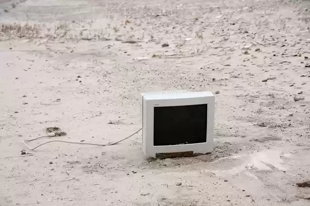 Free download Monitor On The Beach Washed Up -  free photo or picture to be edited with GIMP online image editor