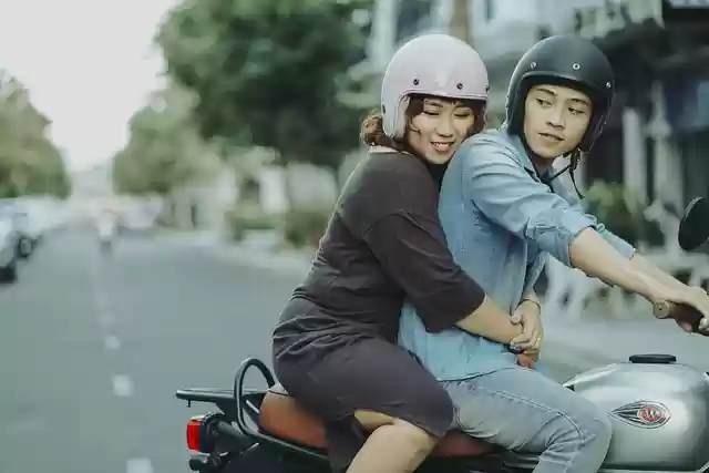 Free download motorcycle couple hug driving free picture to be edited with GIMP free online image editor