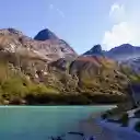 Mountains and large lake  screen for extension Chrome web store in OffiDocs Chromium