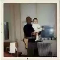 Free download Mr.Ross holding J.C.Booker 2nd in December, 1970 free photo or picture to be edited with GIMP online image editor