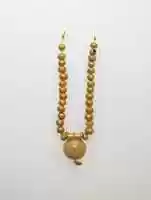 Free download Necklace with bulla and gold beads free photo or picture to be edited with GIMP online image editor