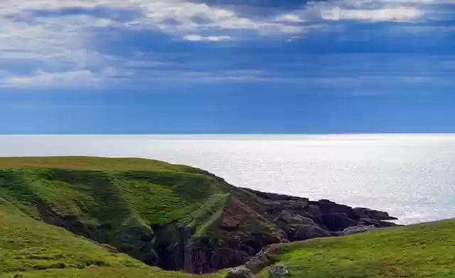 Free download ocean sea coast hills grass sky free picture to be edited with GIMP free online image editor