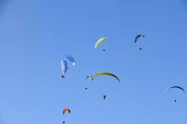 Free download Paragliders Sails Wings Blue -  free photo or picture to be edited with GIMP online image editor