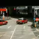 Red cars driving on street in city  screen for extension Chrome web store in OffiDocs Chromium