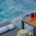 Red Drinks on a Poolside Table  screen for extension Chrome web store in OffiDocs Chromium