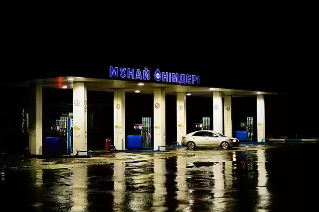 Free download Refueling Car Rain -  free photo or picture to be edited with GIMP online image editor